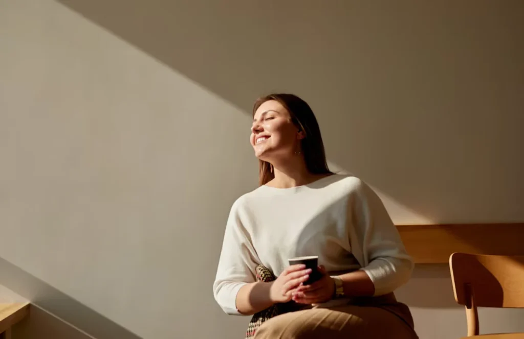 Woman enjoying a sunny moment